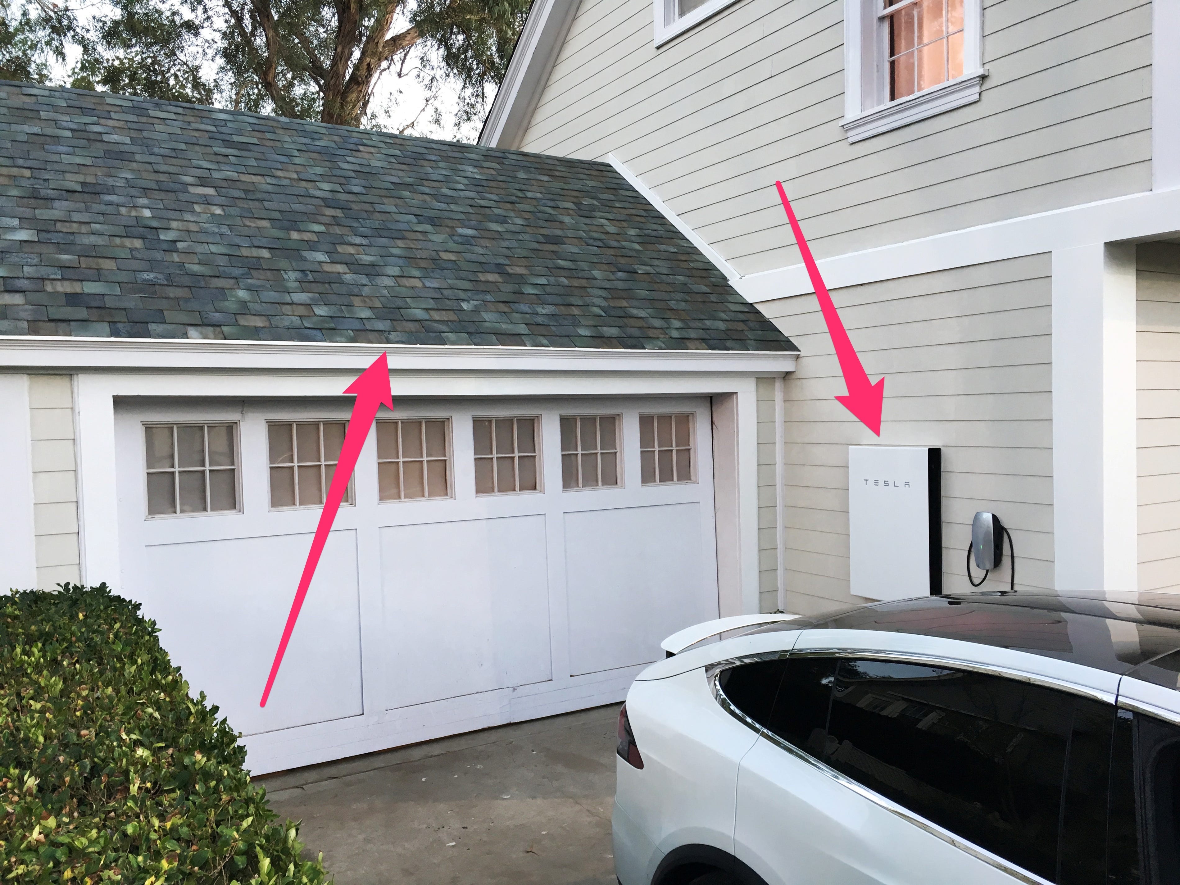 A Tesla Solar roof with a Powerwall battery.