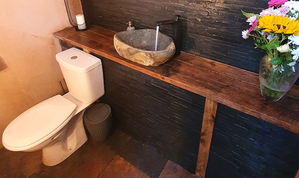 He has now turned the hidden basement into a toilet for his friends and family to use when they come over and spend time in the garden