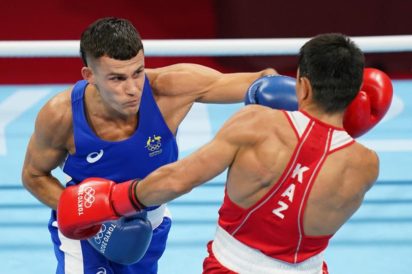 Harry Garside lands a blow on Zakir Safiullin.