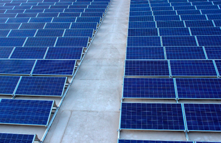 Stock featured panels on roof Credit union covering former department store with solar