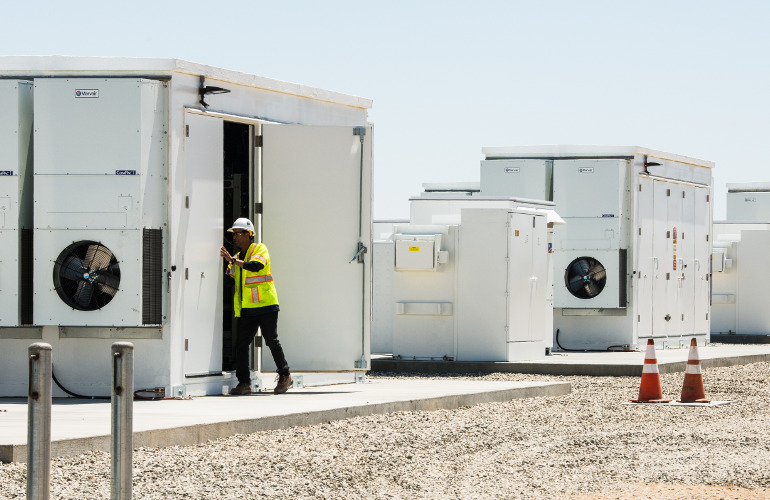 stock nrel battery storage large lithium April 26 , 2018 - Members of NREL, LADWP and the 100% Renewable Energy Advisory Group get a look at the battery storage facility at the Beacon Solar Plant. The tour was part of an overview and chance to exchange information as part of NREL's 100% Renewable Energy Study. (Photo by Dennis Schroeder / NREL)