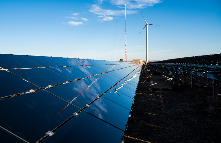 stock solar wind renewable January 10, 2018 - First Solar, a NREL research partner has installed a small PV array used as part of ESI research ongoing at the NWTC. (Photo by Dennis Schroeder / NREL)